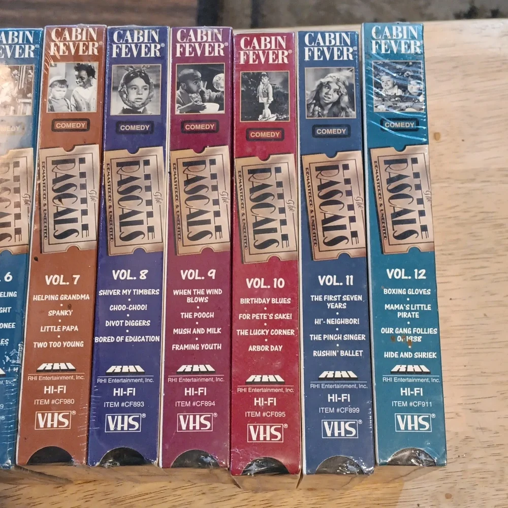 Classic VHS Tape Collection with Colorful Spines 12 Volumes